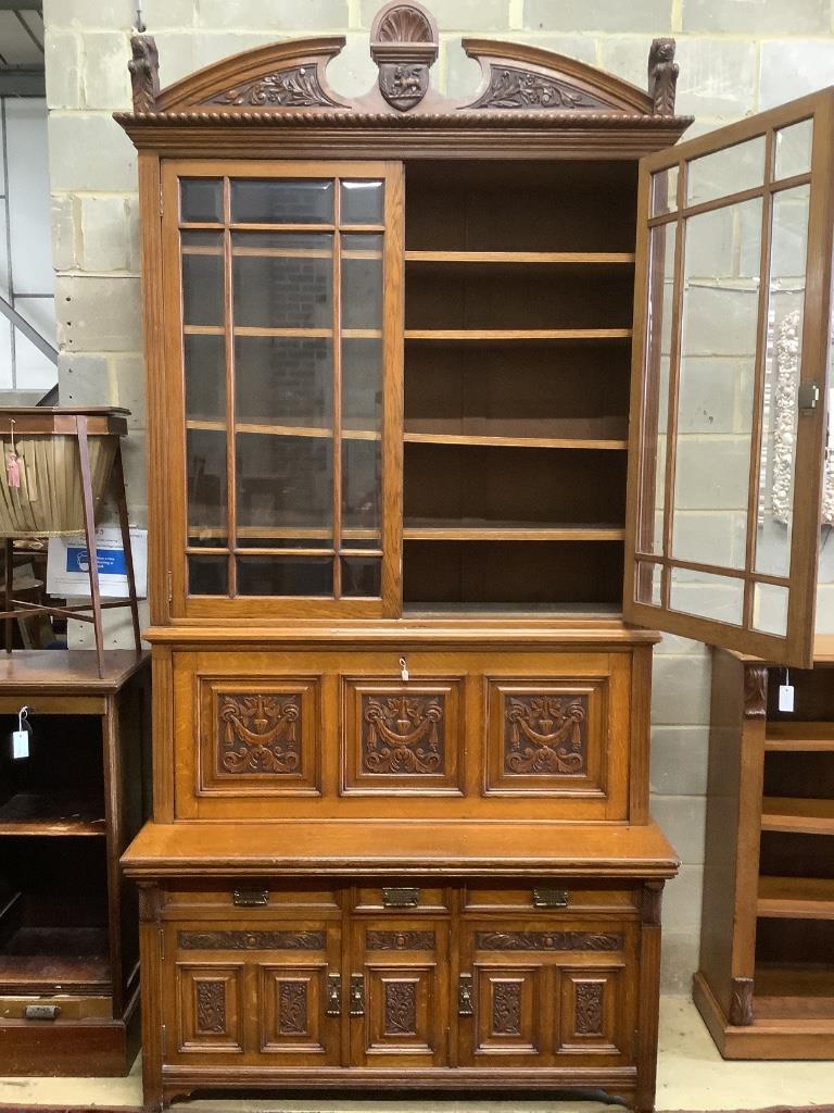 A large Victorian oak secretaire bookcase, width 144cm, depth 61cm, height 290cm, believed to originate from the Hull area having belonged to a member of the Strachan family